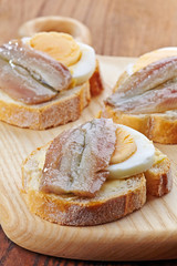 bread with egg and anchovies
