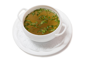 Chicken soup with quail eggs and sausage.