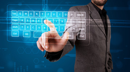 Businessman pressing virtual type of keyboard