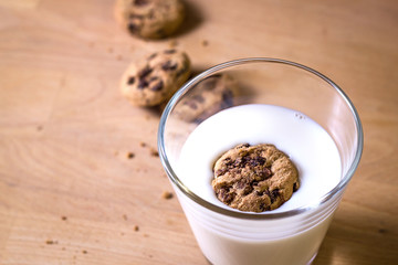 chocolate chip cookie swimming in milk