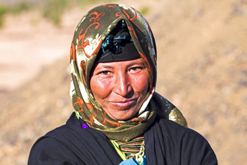 Young nomad woman in the desert