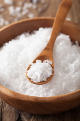 sea salt in wooden bowl and spoon