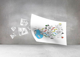 White paper in front of grey wall