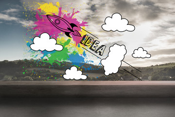 Rocket idea graphic over landscape background