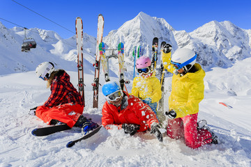 Ski and fun  - family enjoying winter holiday