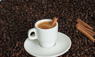 cup of coffee with coffee beans.