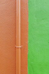 Red and green wall pipe