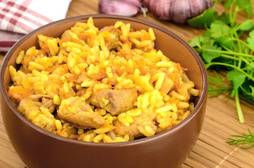 Pilaf in a brown bowl