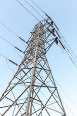 high voltage electrical towers in line