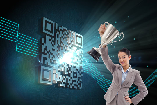 Composite image of businesswoman showing a cup