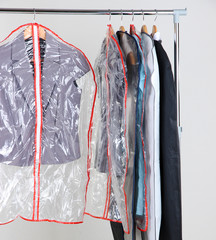 Office female clothes in cases for storing