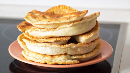 Cheburek fried on a plate