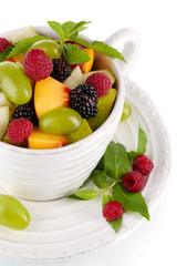 Fruit salad in cup isolated on white