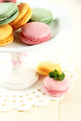 Gentle macaroons in vase on table close-up