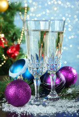 Composition with Christmas decorations and two champagne