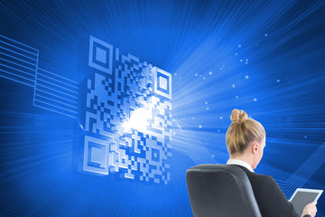 Composite image of businesswoman sitting on swivel chair with ta