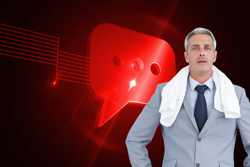 Composite image of sporty businessman with white towel