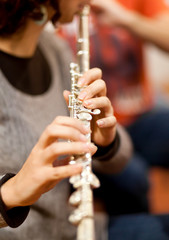 Woman playing transverse flute