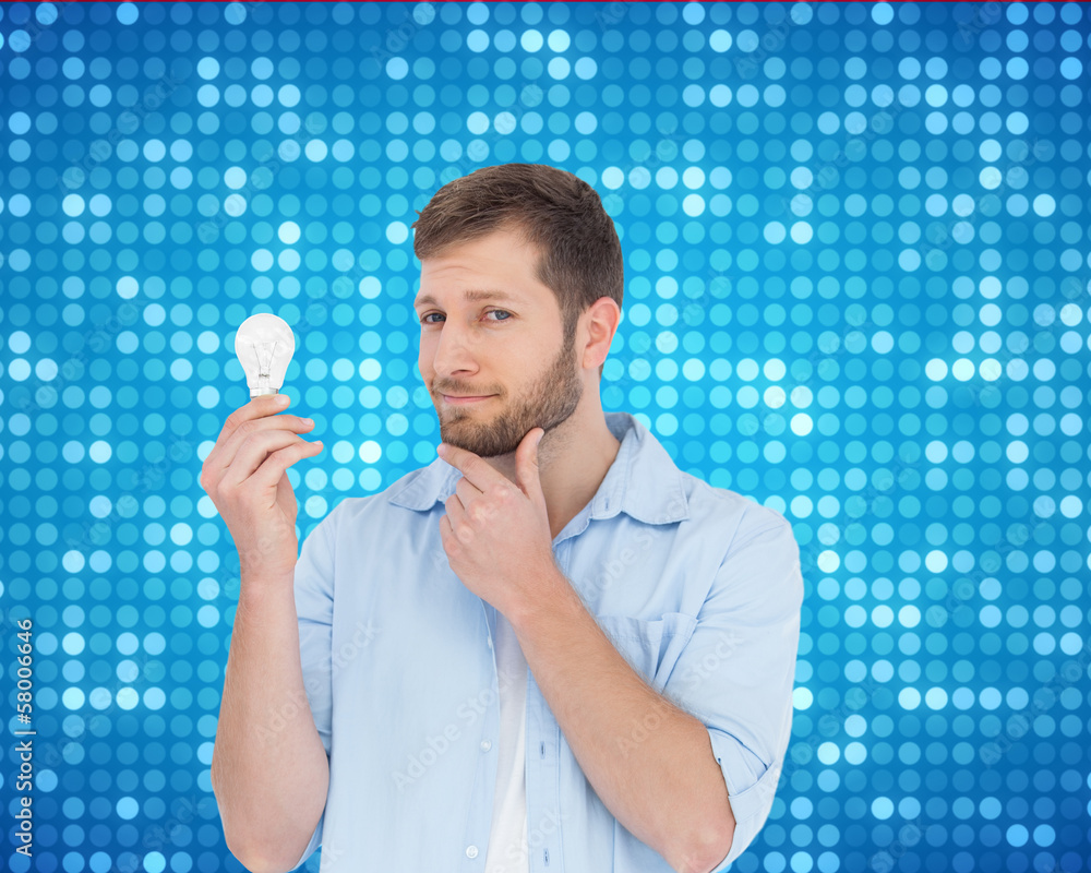Poster composite image of handsome model holding a bulb