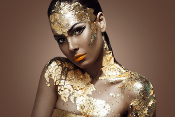 beautiful woman and gold.