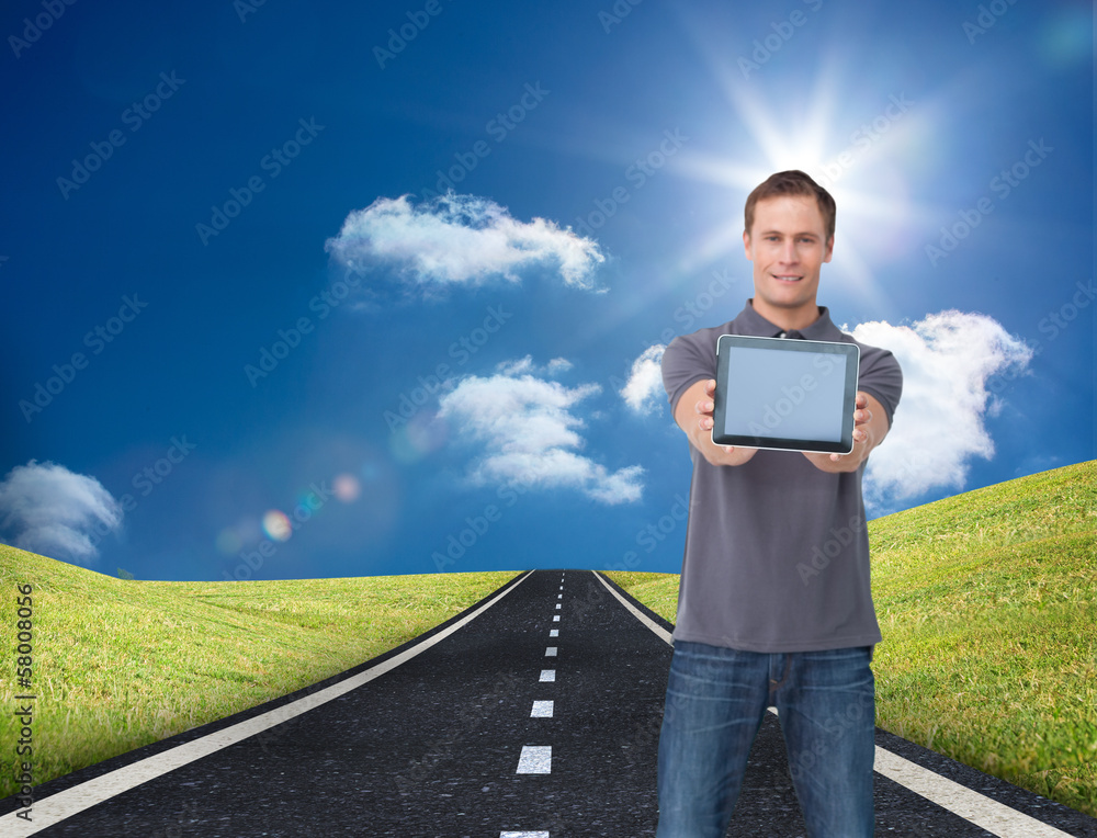 Poster Composite image of young man showing screen of his tablet comput