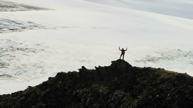 Aerial lone male mountain climber, Alaska, USA