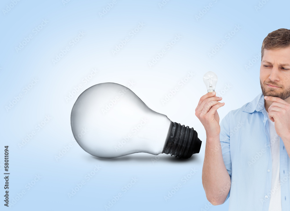 Poster composite image of sceptical model holding a bulb