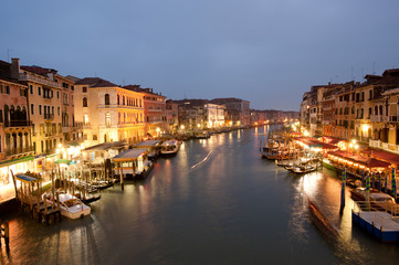 The view of Grand Canal at night from Rialto bridge.
