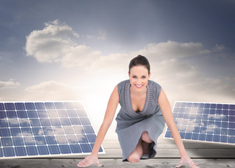 Composite image of smiling gorgeous woman getting ready for depa