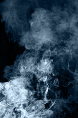 blue smoke on a black background