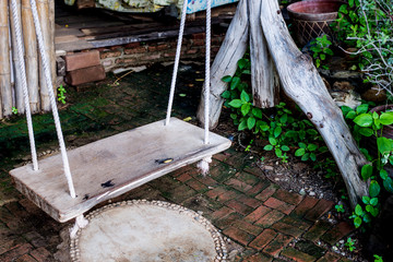 Wood swing in garden