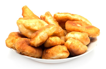 Russian patties in the plate on white background