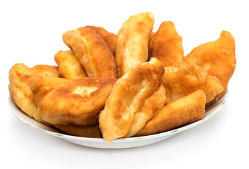 Russian patties in the plate on white background