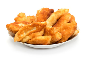 Russian patties in the plate on white background