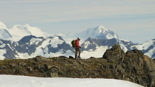 Aerial view of male mountain climber in summer, Alaska, USA