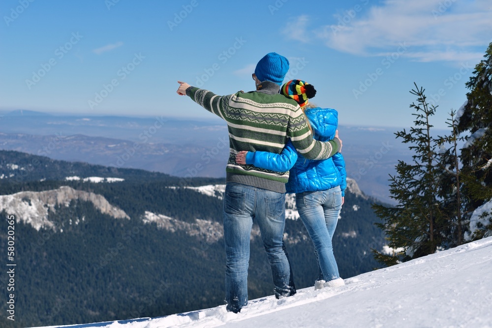 Wall mural young couple on winter vacation