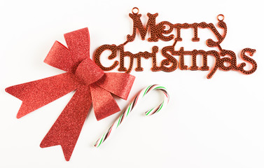 Merry Christmas sign with red bow and candy cane