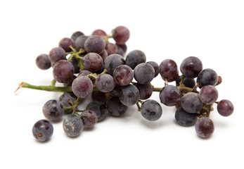 black grapes on a white background