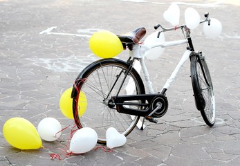 decorated bicycle to make a joke to two future bride