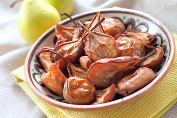 Baked pears on a folk style plate