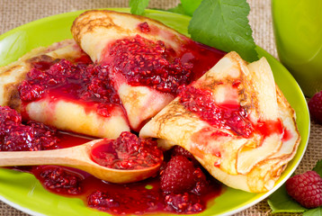 Homemade pancakes with raspberry jam