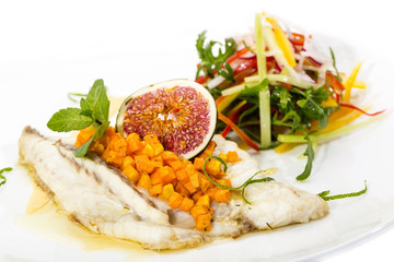 Baked fish with salad