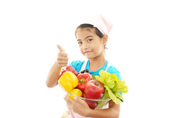 野菜を持つ女の子