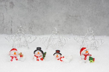 Weihnachtsgutschein mit Schneemännern