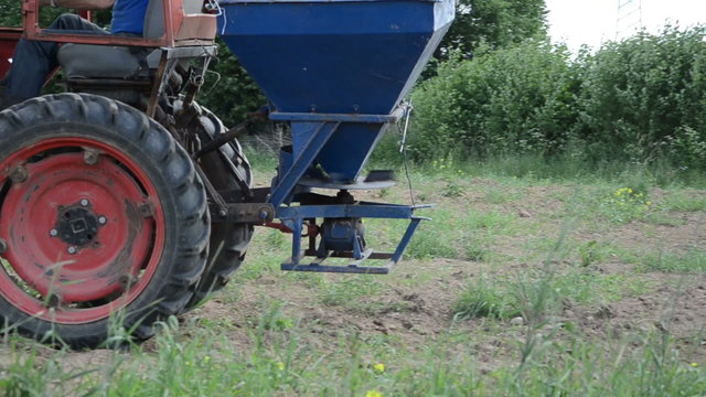 follow retro tractor wheel seeder equipment sow buckwheat seeds