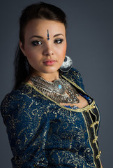 beautiful young girl in a historical dress