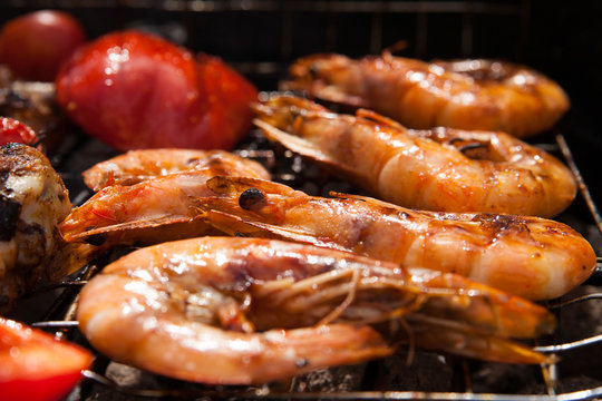 Grilled prawns on the barbecue rack at the garden party