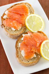 bread with salted salmon and lemon