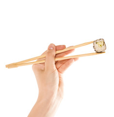 Sushi roll with chopsticks isolated