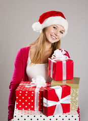 Beautiful christmas woman with gift